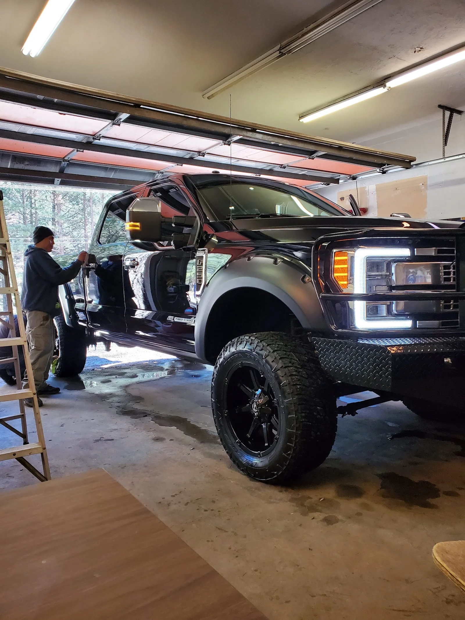 Inside Reflections Auto Salon — detail bay and work area